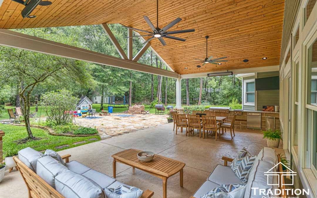 Custom Outdoor Living Space in Magnolia, Texas Featuring a Patio Cover and Outdoor Kitchen